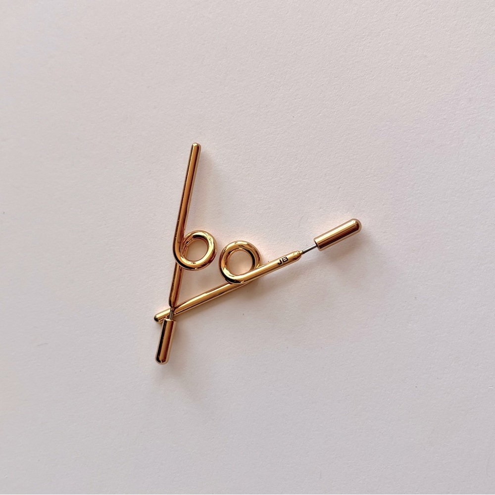 Jenny Bird Otis Sticks in gold. Comes with original jewelry bag